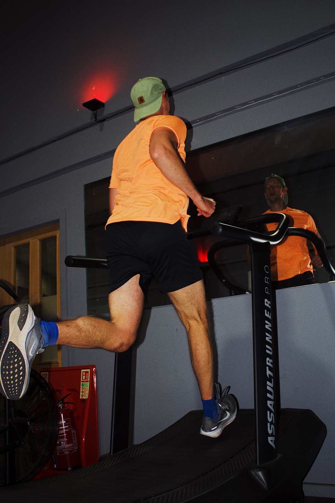 A member running on a treadmill during training at GymSpace
